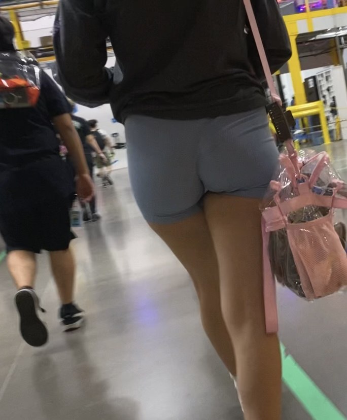 Latina babe at work with short booty shorts