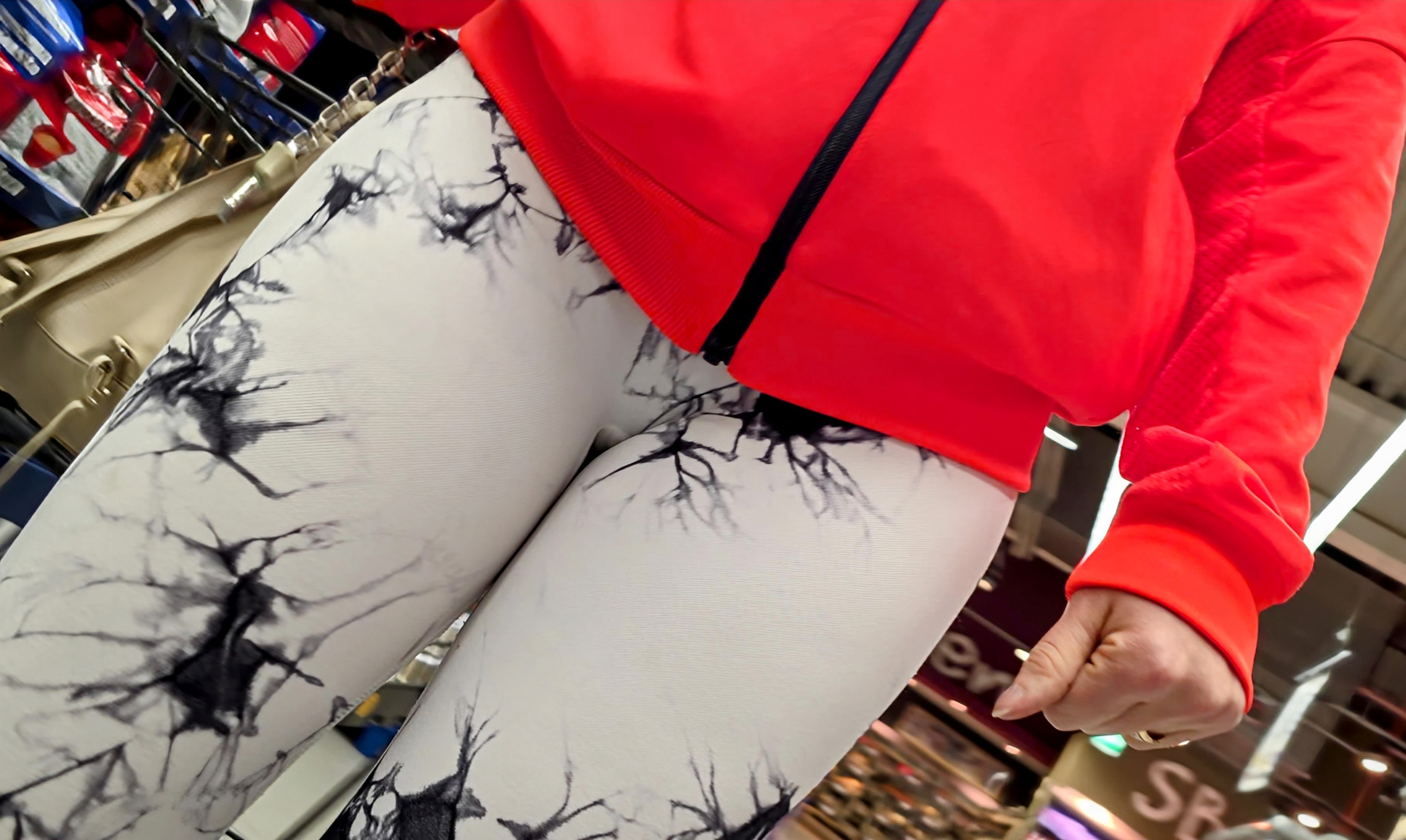 Milf in white leggings with black pattern