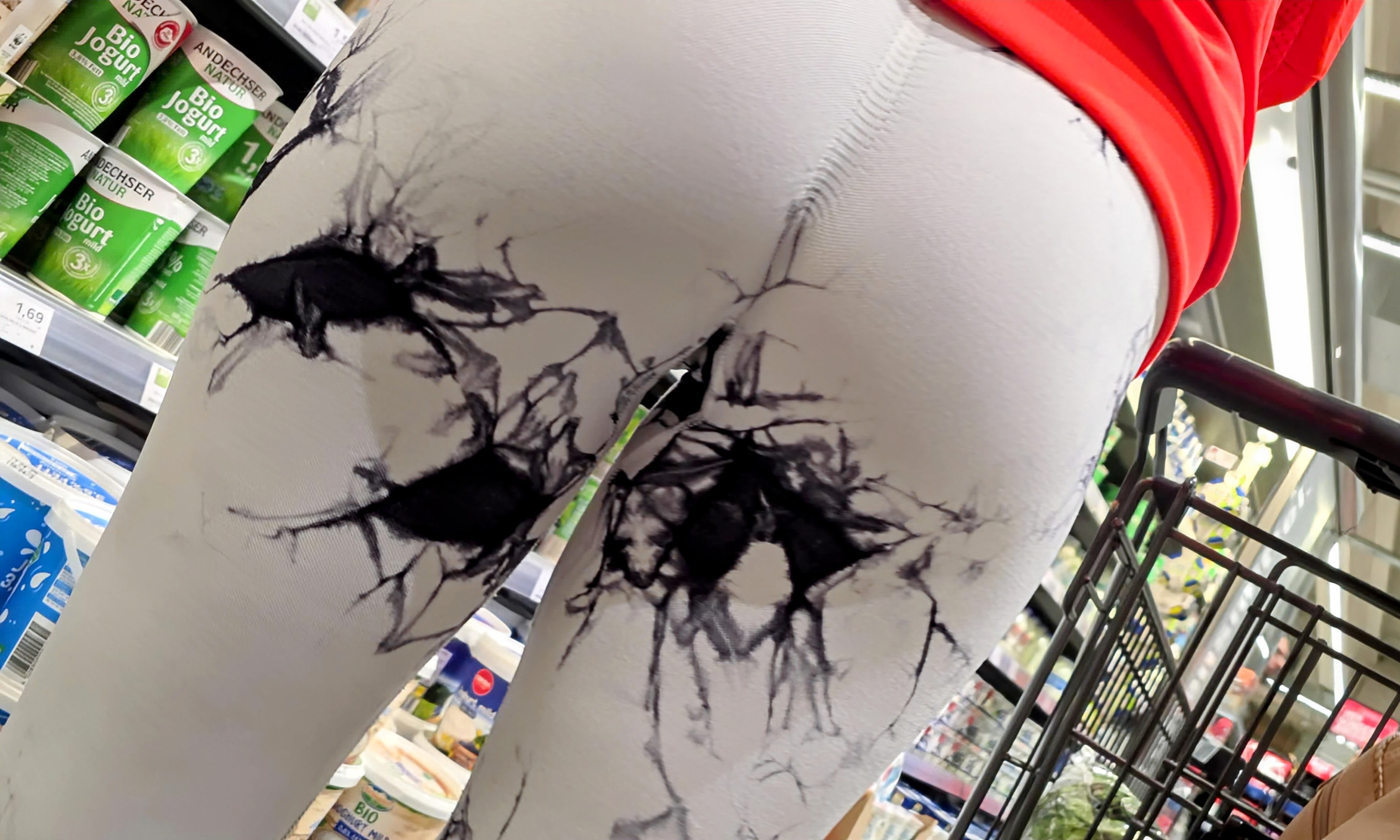 Milf in white leggings with black pattern