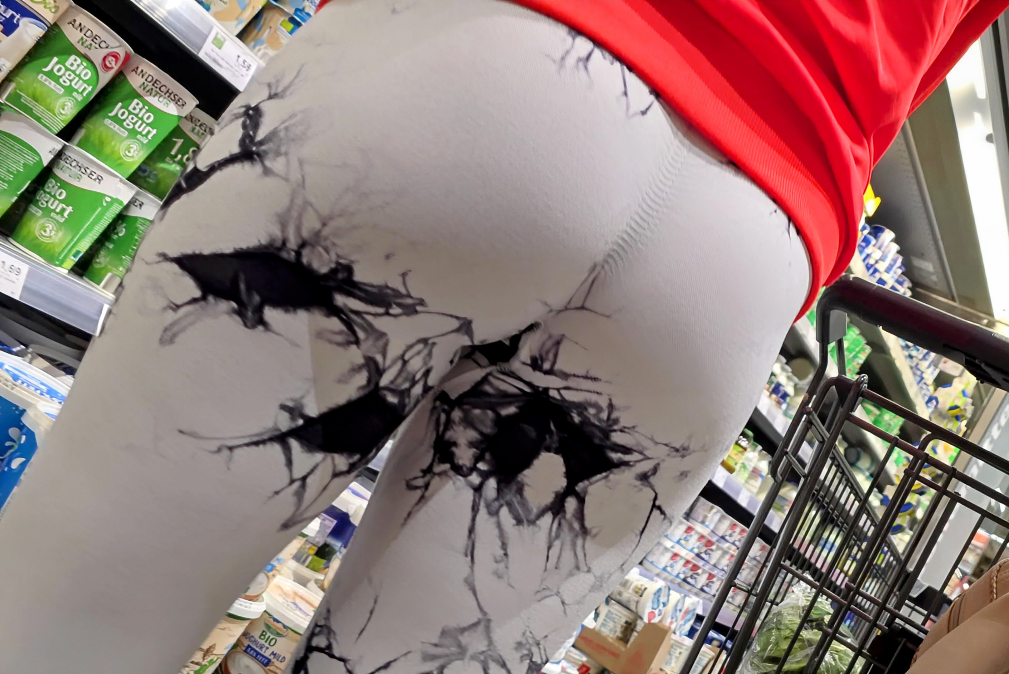 Milf in white leggings with black pattern