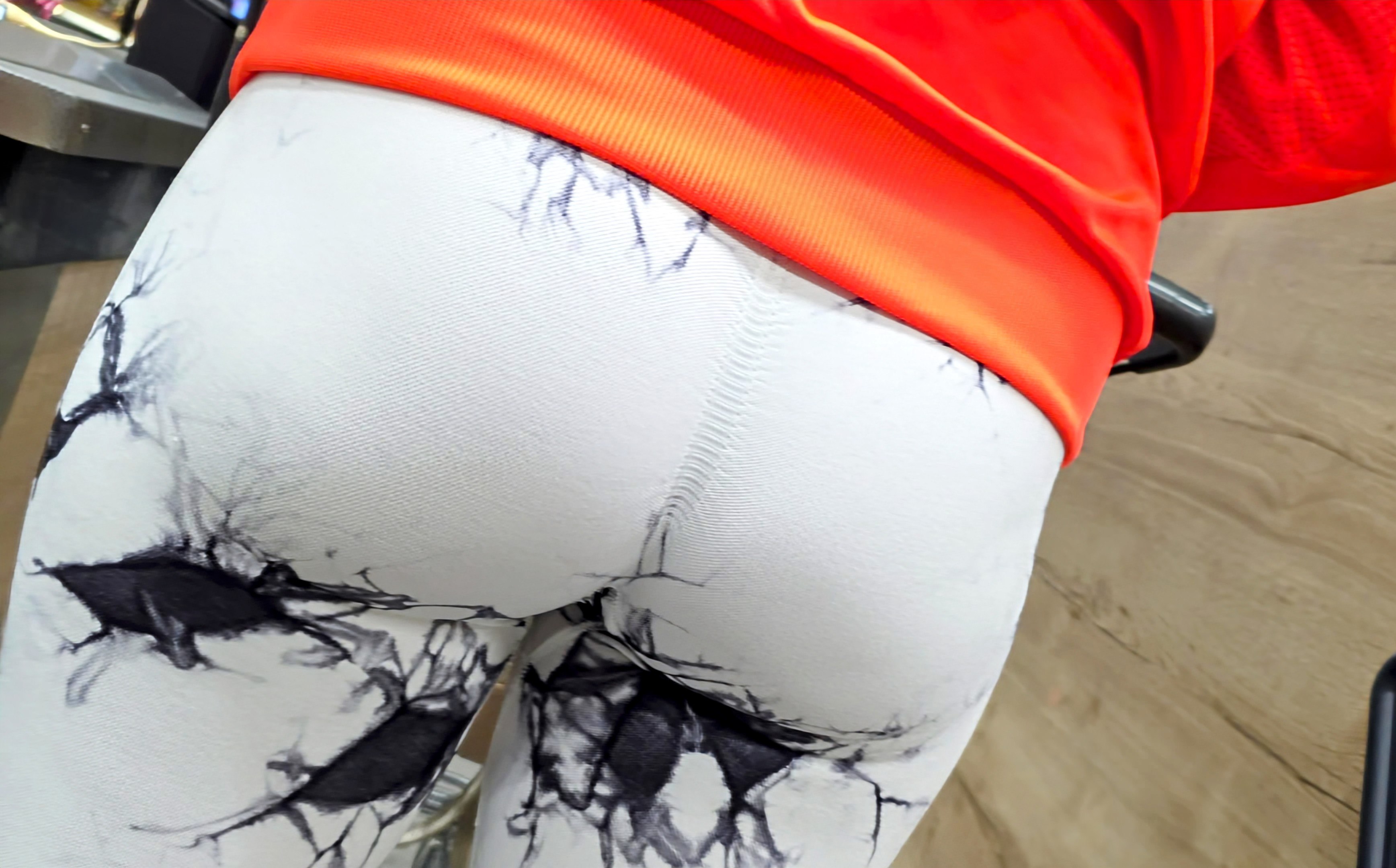 Milf in white leggings with black pattern