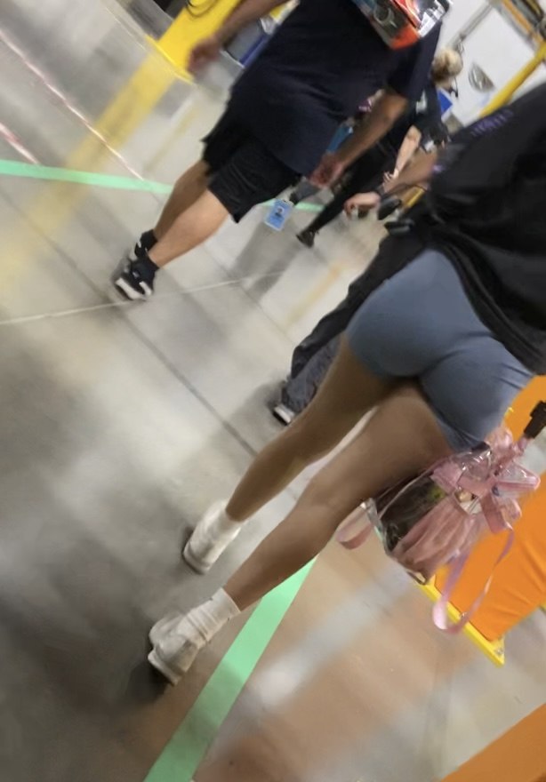 Latina babe at work with short booty shorts