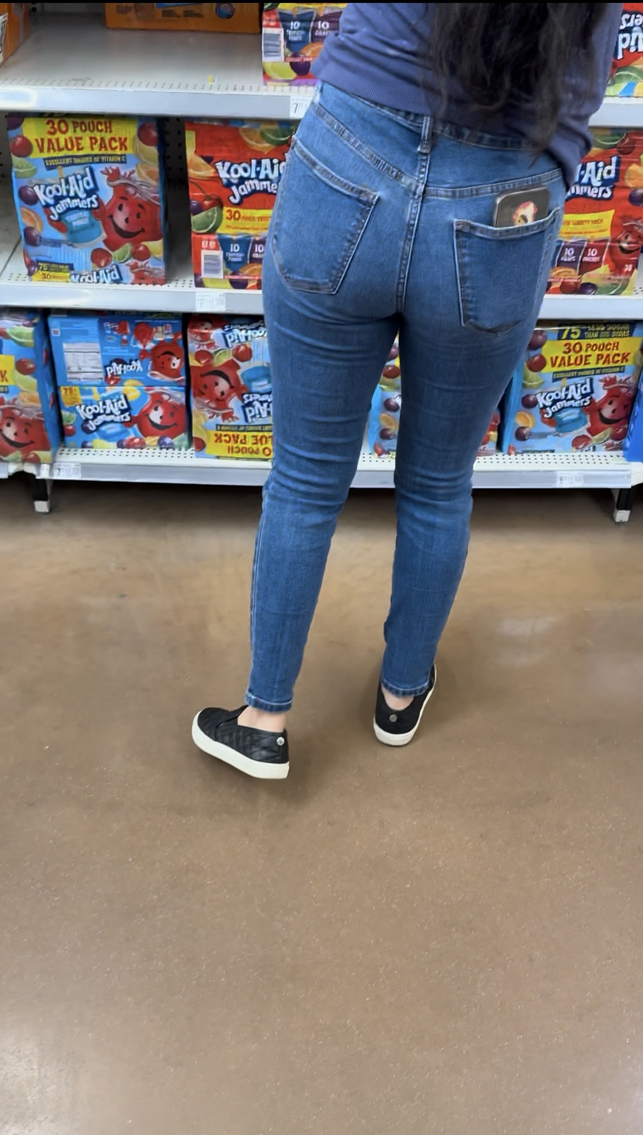 Short Latina in tight jeans