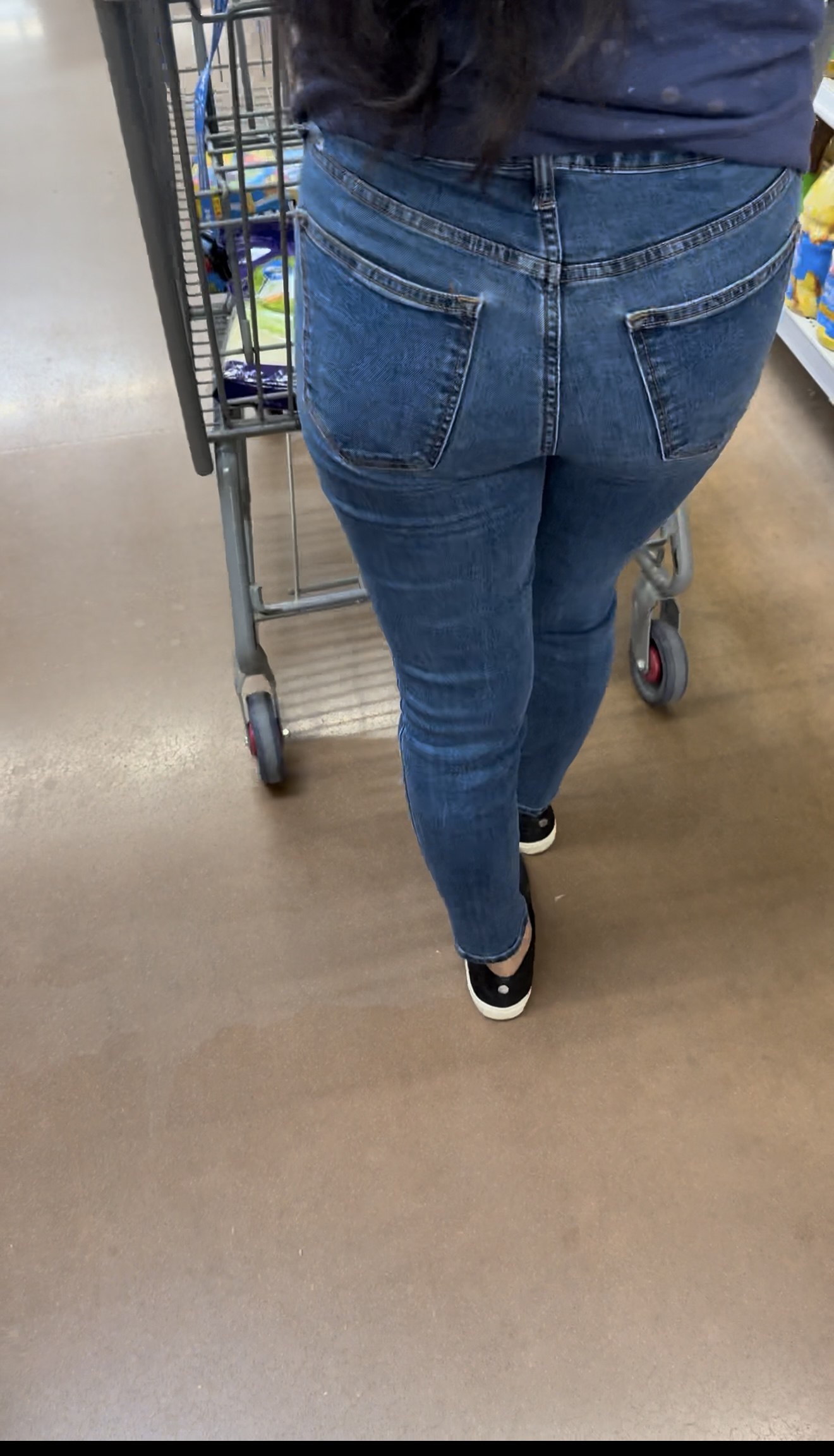 Short Latina in tight jeans
