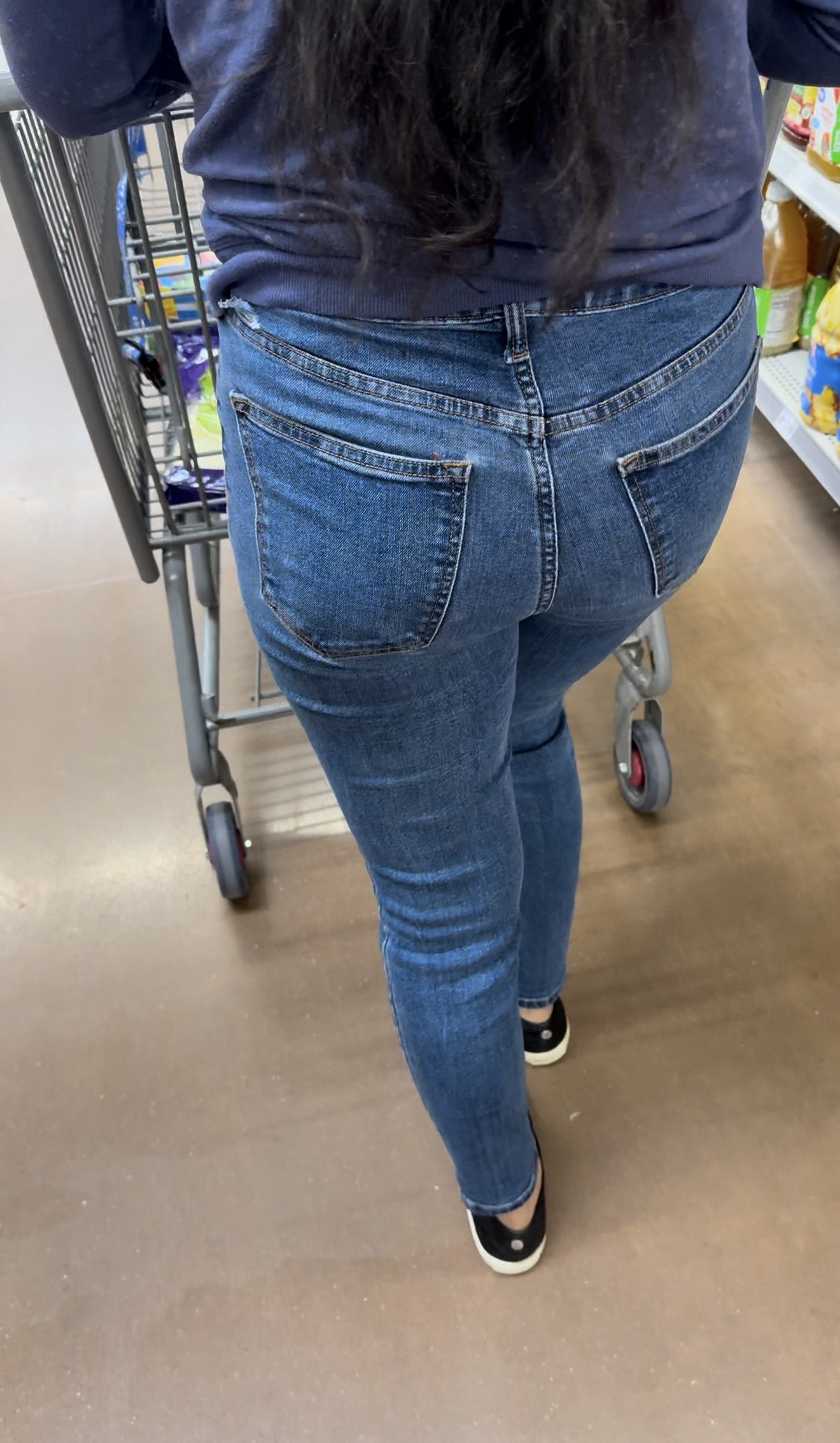 Short Latina in tight jeans