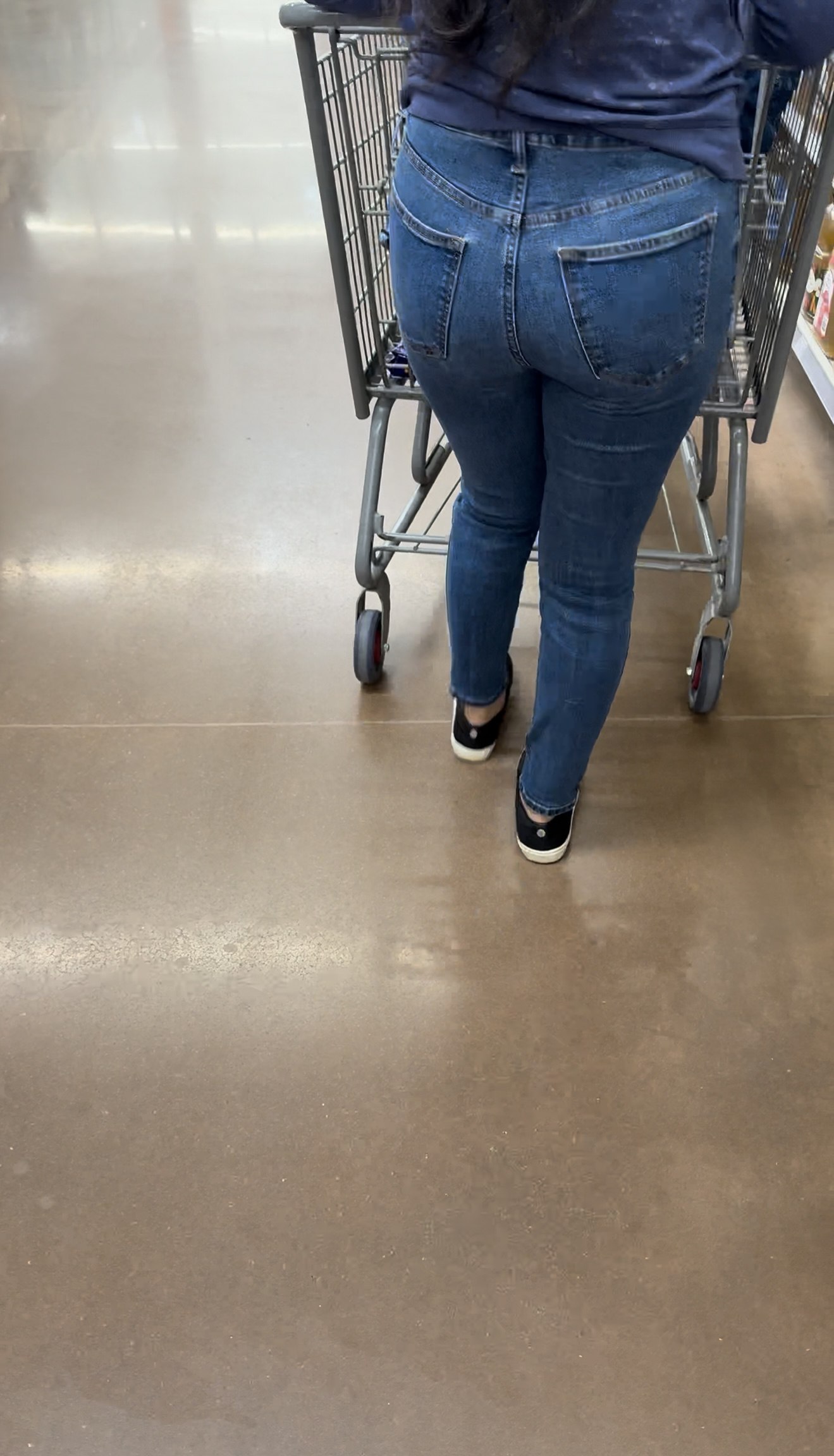Short Latina in tight jeans