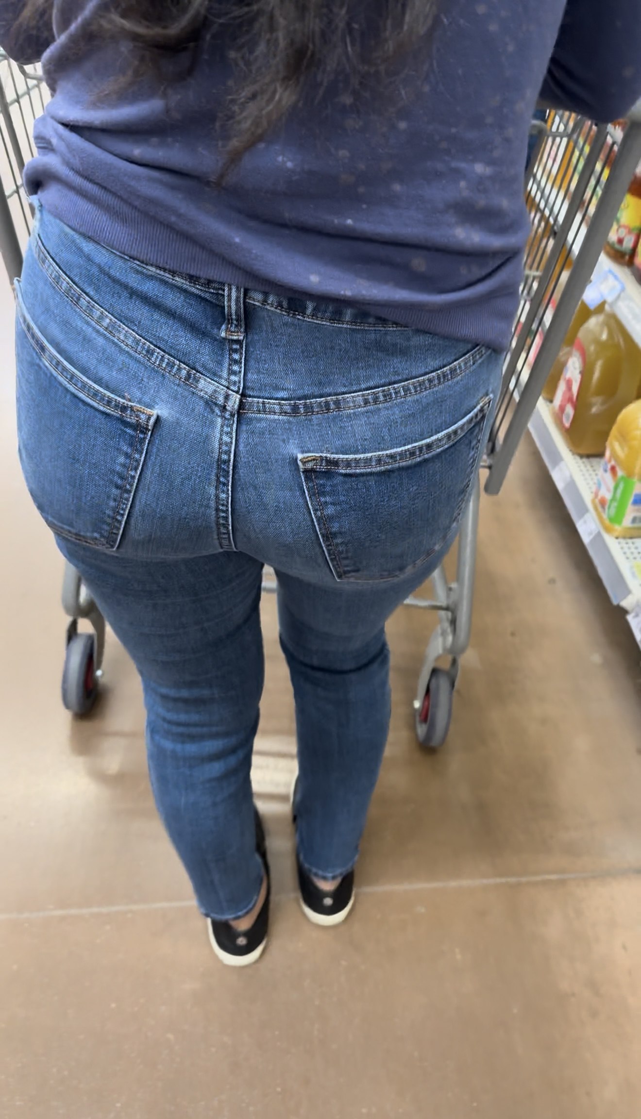 Short Latina in tight jeans