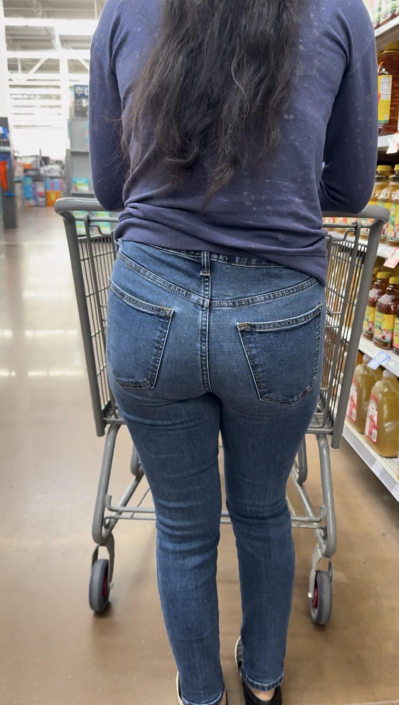Short Latina in tight jeans