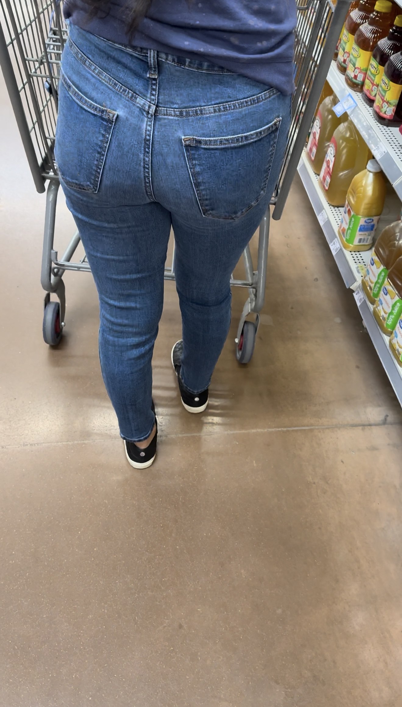 Short Latina in tight jeans
