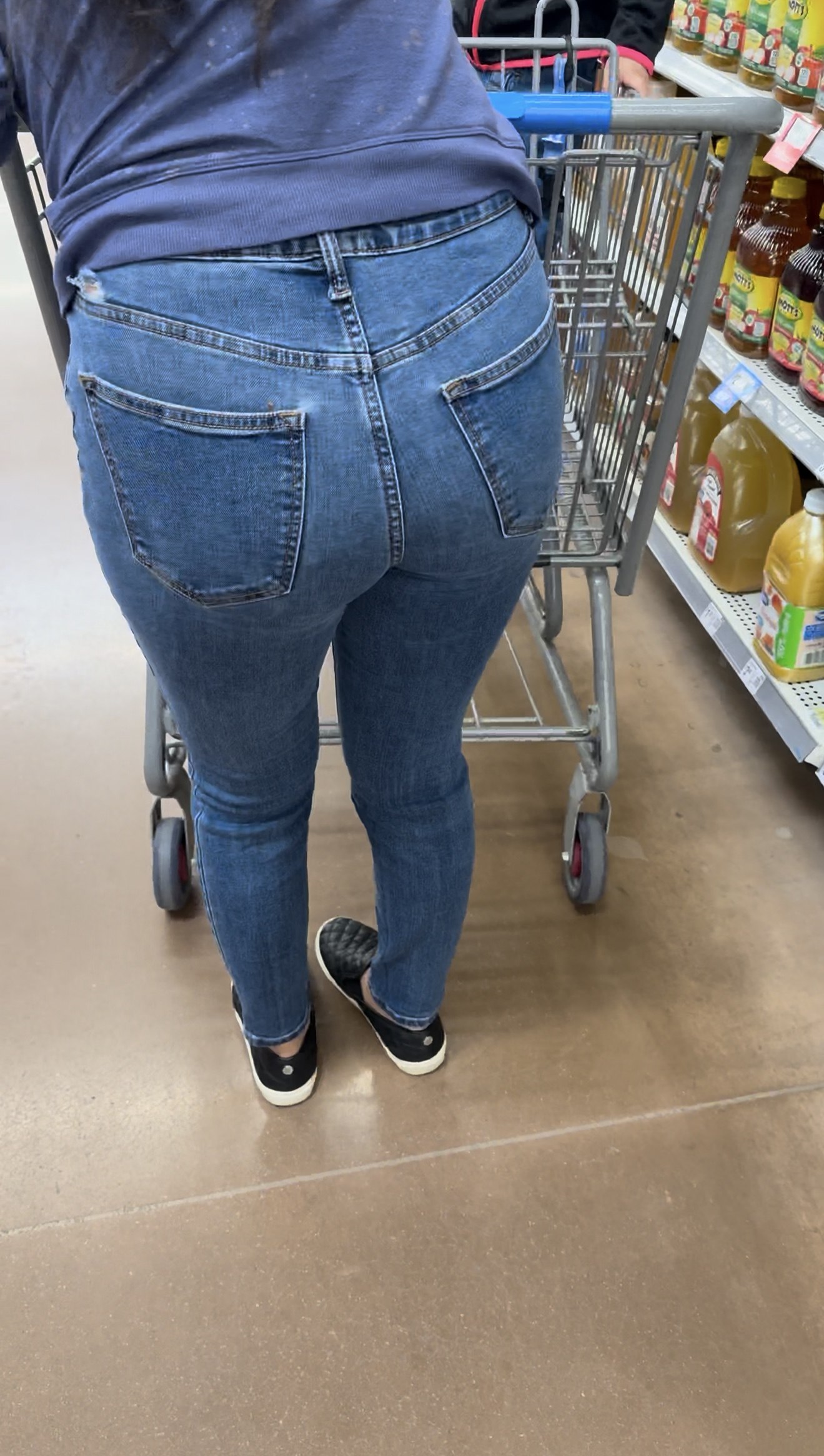 Short Latina in tight jeans